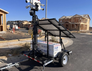 Solar-powered mobile surveillance trailer with multi-camera tower and live monitoring setup on active construction site in California – PSS On-Site solar security unit protecting job site with 24/7 AI video surveillance